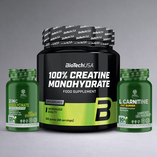 Pack de trois compléments BioTechUSA Créatine Monohydrate, Perfect Nutrition Zinc Bisglycinate et L Carnitine Fat Burner posés sur fond studio gris dégradé premium, visuel e‑commerce musculation, énergie et brûle‑graisse.
